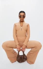 Using a soft tape measure, measure from the center of your armpit down your arm towards your wrist. Camel Bandage Zip Up High Neck Long Sleeve Bodysuit Prettylittlething Qa
