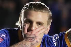 Ex-Rangers and Hibs ace Jason Cummings' Joker celebration turned into  protective face mask