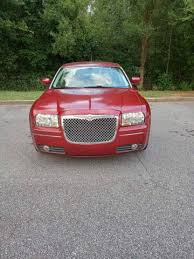 Image result for Deep Coral Red 2008 Chrysler