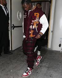 Part of the travis scott (13) set. Travis Scott Wears Red From Head To Toe With Classic Jordan Sneakers And Diesel Plaid Cargo Pants Travis Scott Fashion Travis Scott Outfits Travis Scott