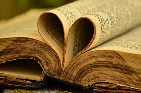 Royalty-Free photo: Bokeh shot of book page formed heart | PickPik