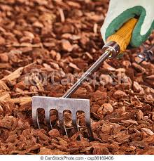 Check out our metal rake selection for the very best in unique or custom, handmade pieces from our tools shops. Hand Held Garden Rake Over Wood Chips Single Gloved Hand Holding Small Wooden And Metal Rake Over Brown Wood Chip Mulch Pile Canstock