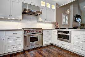 This timber and white kitchen is the epitome of a modern shaker style kitchen. Beautiful Shaker Style Kitchen Cabinets Shaker Style Kitchen Cabinets White Shaker Kitchen Cabinets Kitchen Cabinet Styles