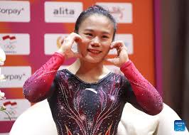 China's Zhang Qingying wins balance beam title at Artistic ...