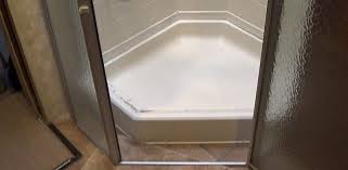 Grab the shower head and turn it on. Rv Shower Stall Repairs New Door Sweeps And Reseal