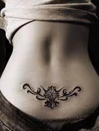 Just below his crucifix tattoo, mcgregor has a helix of thorns going towards his lower back. What Does Lower Back Tattoo Mean Represent Symbolism