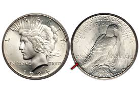 how to identify valuable peace silver dollars