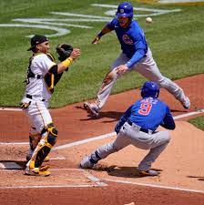 Because he's not afraid to possibly jinx a catch by doing the chef's kiss motion. Javier Baez And Cubs Baffle Pirates Infielders In Wild Play The New York Times