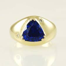 Tanzanite And Diamond Ring A Gorgeous Trillion Tanzanite Is The Centre Piece Of This Really Stunning R Tanzanite Jewelry Tanzanite Diamond Ring Tanzanite Ring
