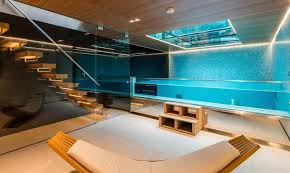 This 18th Century London Townhouse Hides A Swimming Pool Under A Glass Floor Indoor Pool House London Townhouse Georgian Homes