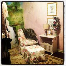 This iconic winged club chair with bold nailhead trim has a classic tufted back and burnished mahogany bun. Floral Chair And Ottoman Floral Chair Cottage Furniture Decor