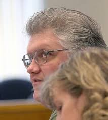 Whistle-blower settles case