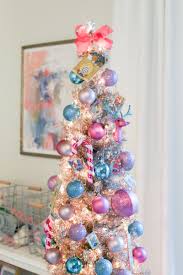 This tree with a dust of snow so it makes you. Little Girls Colorful Christmas Tree Cristin Cooper