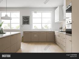 White kitchen with a beige wood island and oil rubbed bronze hardware surrounded by white flat front cabinets and glazed green backsplash tiles. Side View White Beige Image Photo Free Trial Bigstock