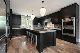 Laminate is a synthetic material placed on particleboard, which is made of compressed wood. Are Dark Kitchen Cabinets In Style Decor Snob