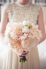 Carry a bouquet in bright, happy colors like sunshine yellow, orange, and bright pink to set a festive. Summer Flower Wedding Bouquets
