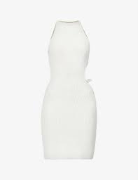 She is looking at her dress hanging on the wall. Aya Muse Mila Cut Out Knitted Midi Dress Selfridges Com