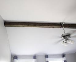 How To Faux Wood Beam On A Vaulted Ceiling Hazel Darling Faux Ceiling Beams Ceiling Beams Living Room Faux Wood Beams
