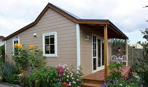 Kitchen with cooktop, fridge, microwave. One Bedroom Cottage Transportable Homes Christchurch Cottage Co Nz
