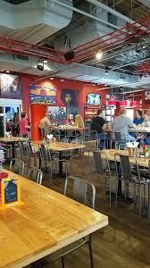 Bfm Seating Industrial Tara Chair And Barstools In This Rock N Roll Themed Bar And Restaurant Restaurant Interior Design Top Furniture Stores Furniture Casters