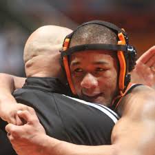 Wrestling: Hill Overcomes Injuries to Win State Title