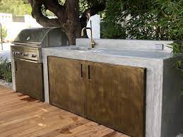 If you want heavy duty cabinets for your outdoor kitchen, then maybe you'd like them to have a concrete countertop. Burlingame Outdoor Kitchen Outdoor Cooking Spaces Concrete Outdoor Kitchen Outdoor Kitchen