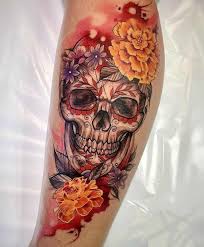 The symbols and elements that are used on her face can give meaning to the tattoo. Sugar Skull Tattoos Meanings Tattoo Designs Ideas