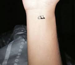 Tiny Panda Tattoo On The Wrist Styleoholic Small Animal Tattoos Panda Tattoo Tiny Tattoos For Girls
