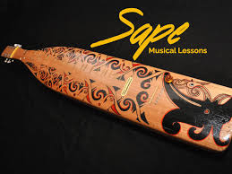 It is carved from tree trunk in an elongated… Iyurni Ului Mahir Petik Sape Hasil Tunjuk Ajar Suami Sarawakvoice Com