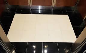 The floor is typically composed of a quarter inch of plywood, adhered to the metal floor of the cab with screws and adhesive. Black Granite Elevator Floor Refinished Set In Stone Restoration
