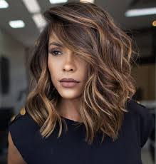 NEW!!!!! Scaled hair is back in all sizes Bob, Midi, Long Bob, Longxxl…..  more movement more volume…. The Butterfly cut is here to stay this season!!  Call today to schedule! ☎️443-513-4248 www.Salon16Berlin.com
