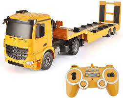Buy, sell, and search for work trucks, trailers, and equipment. Amazon Com Fistone Rc Truck Detachable Flatbed Semi Trailer Engineering Tractor Remote Control Low Loader Die Cast Car Model Kids Electronics Hobby Toy With Sound And Light Effect Toys Games