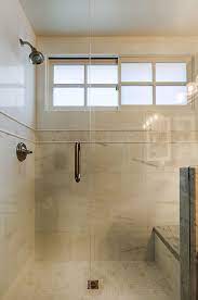 Small windows are dressed with simple black shade adorned with pink ribbon. Small Bathroom Window Houzz