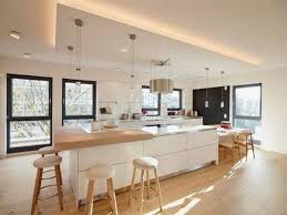 Plan de travail en corian avec intégration d'un écran tactile. La Cuisine Blanche Et Bois En 102 Photos Inspirantes Archzine Fr