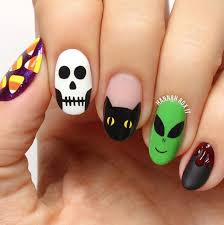 These clever halloween nails use both stiletto nails and square nails to create the look of vampire teeth. 23 Spooktacular Halloween Nail Art