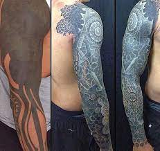 55 Incredible Cover Up Tattoos Before And After Cuded Black Tattoo Cover Up Tattoo Sleeve Cover Up White On Black Tattoo