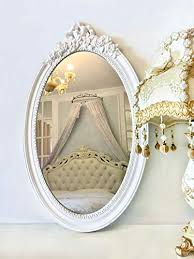 Buy gold oval mirrors online! Basswood Hunters 25 X 16 Large Oval Vintage Decorative Wall Mirror White Wooden Crown Frame Antique Princess Decor For Bedroom Playroom Dressers Living Room Buy Online In Belize At Belize Desertcart Com Productid 157706366