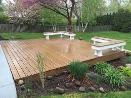 A 12'x12′ square deck is excellent for setting up a table for six with a little extra space. Ground Level Transcend Deck With Built In Seating Modern Deck New York By Deck Guardian Houzz