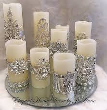 They are made at home. Candle Set Flickering Led Wax Pillar Candle Set Embellished Candles Bling Candles Pillar Candles Jeweled Candles Weddings Candle Embellishments Bling Candles Silver Christmas Decorations