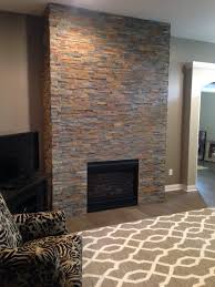 Decorating around a wood burning stove doesn't have to be complicated or costly. Fireplace Stone Work 2 Gds Construction