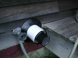 Tankless hot water heater outside. Guy Marsden Sustainable Living Tankless Water Heater