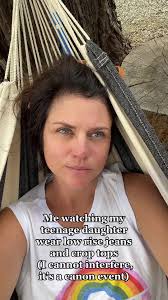 Tweens Wearing Crop Tops and Low Rise Jeans