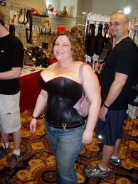 Big Boobs, This lady was wearing a corset that pushed her b…