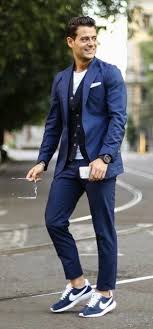 Fall Business Casual Inspiration With A Blue Suit White T Shirt Navy Cardigan Watch Sunglasses Nike Dapper Mens Fashion Suits And Sneakers Mens Fashion Classic