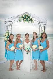 I Love The Blue Color Of The Bridesmaid Dresses And The Wedding Dress Beach Wedding Bridesmaid Dresses Beach Bridesmaid Dresses Turquoise Bridesmaid Dresses