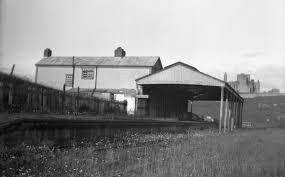 Wonderful view of Cashel Railway Station from The Rock. Must have been some kind of mass on. Not much health & safety in operation that day.