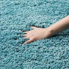At nuloom, we believe that floor coverings and art should not be mutually exclusive. Safavieh Milan Shag Aqua Blue 2 Ft X 4 Ft Solid Area Rug Sg180 6060 24 The Home Depot