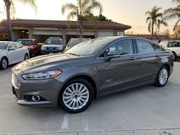 To see just how bright the 2014 ford fusion titanium energi shines, we tested the sedan on the track and in the real world to determine how it compares to the toyota prius. Sold 2014 Ford Fusion Energi Plug In Hybrid Titanium Sedan 4d In Upland