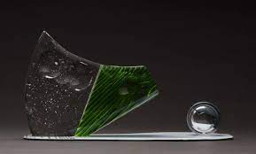 The symbolism behind this design is that the bird has been reborn, leaving behind its old self and becoming renewed and more powerful. Iama Glassblower I Roll Up Human Or Pet Ashes With Hot Glass And Make Them Into Paperweights For Their Loved Ones Ama Iama