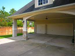I Love This Overhang In Front Of The Garage Doors It Will Keep The Weather Off Including The Hot Sun Garage Exterior Storybook House Plan Garage Design